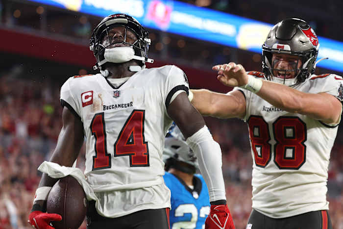 Dec 3, 2023; Tampa, Florida, USA; Tampa Bay Buccaneers wide receiver Chris Godwin (14) celebrates after he scored a touchdown against the Carolina Panthers during the second half at Raymond James Stadium.